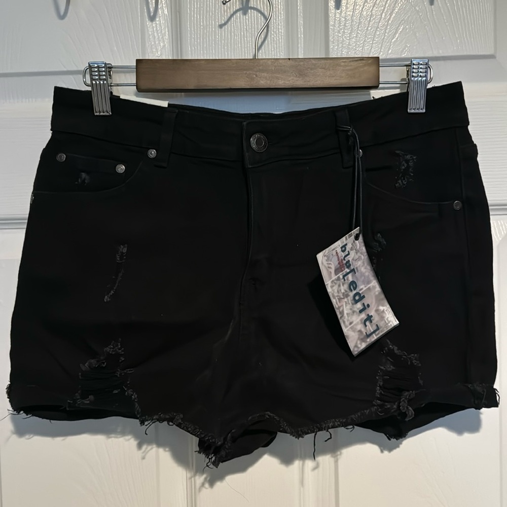 Distressed denim shorts